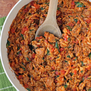 Cajun Chicken Orzo Skillet stirred in pan