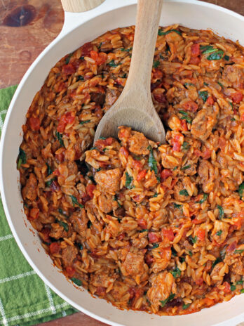 Cajun Chicken Orzo Skillet stirred in pan