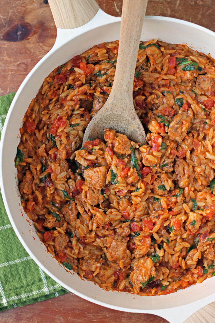 Cajun Chicken Orzo Skillet stirred in pan