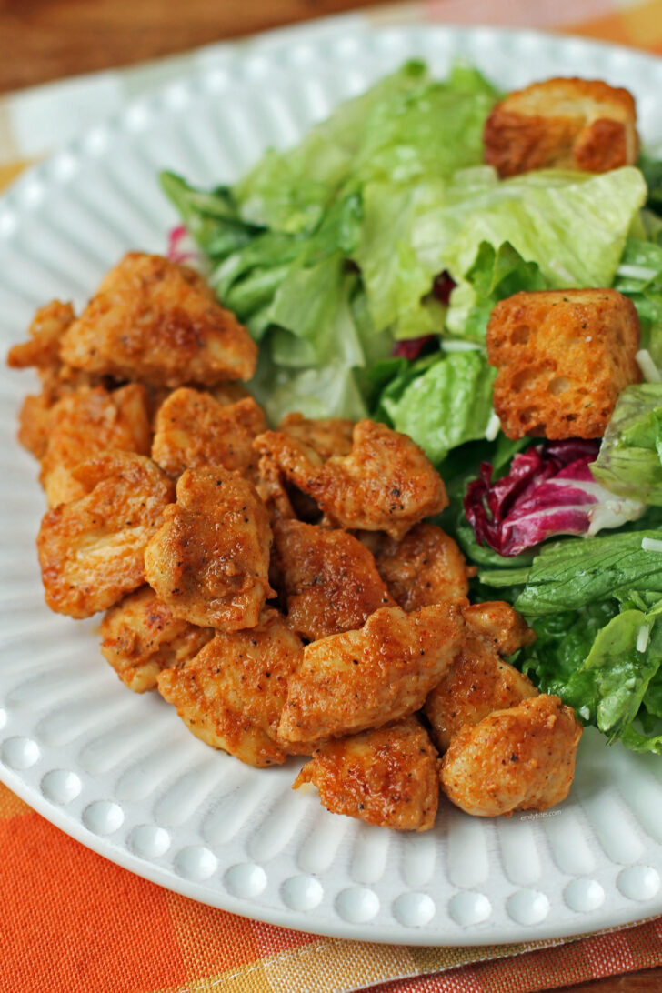 Brown Sugar Mustard Rubbed Chicken Bites plated with salad