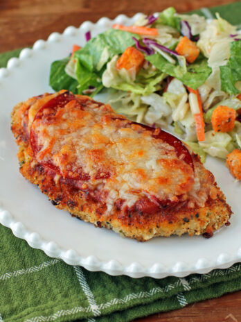 Chicken Pizzesan plated with salad
