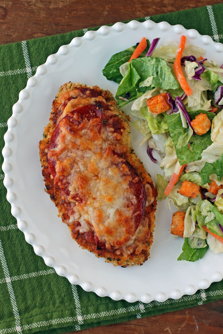 Chicken Pizzesan on a plate overhead view