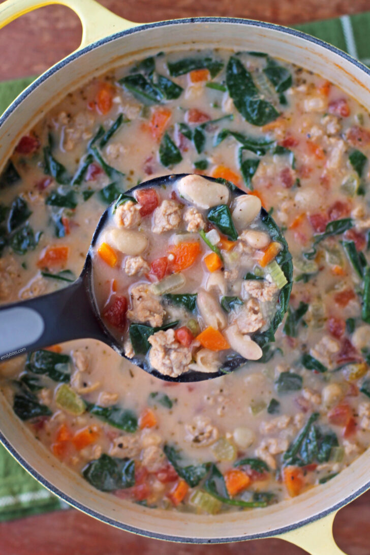 Italian Sausage and White Bean Soup scooped from the pot