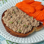Easy Tuna Salad on rye toast plated with carrots