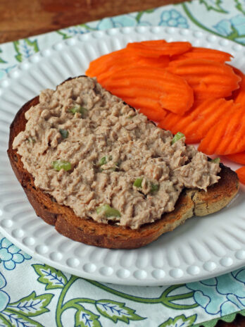 Easy Tuna Salad on rye toast plated with carrots