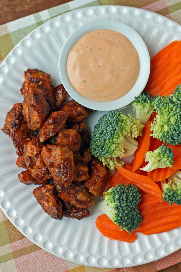 Saucy Barbecue Chicken Bites overhead plated with veggies