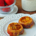 Waffle Bacon and Egg Cups plated with coffee and strawberries