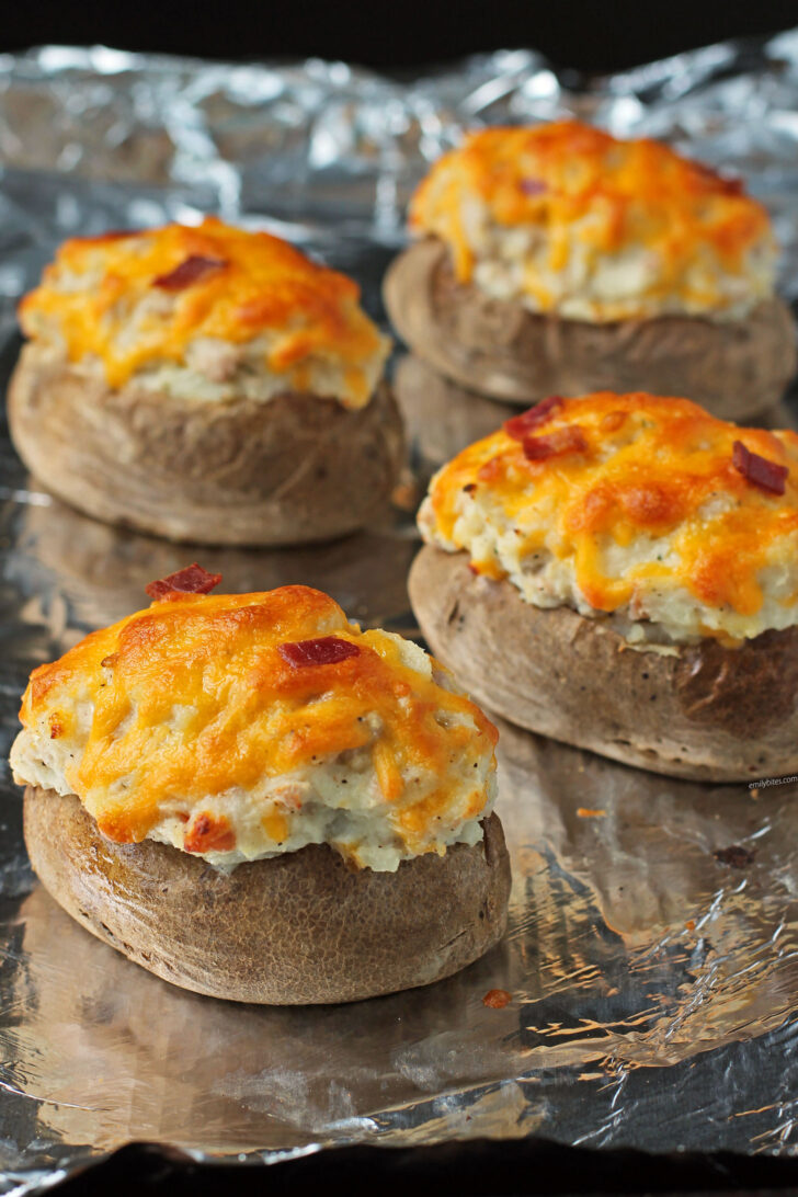 Chicken Bacon Ranch Stuffed Twice Baked Potatoes on a baking sheet