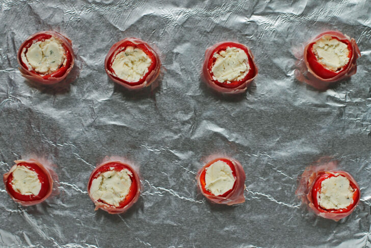 Prosciutto Wrapped Stuffed Cherry Peppers before baking