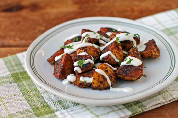 Buffalo Roasted Potatoes with a ranch drizzle