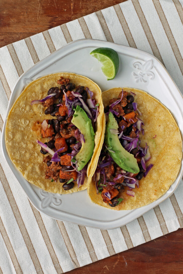 Chorizo Sweet Potato and Black Bean Tacos on a plate